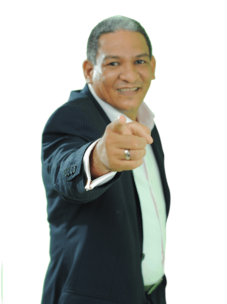 Smiling man in suit pointing back Smiling man in suit pointing back